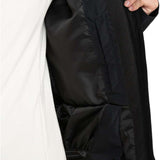 Roxy Women's Billie Insulated Jacket 2024 - A black insulated jacket with a zippered front and two pockets on either side, worn by a model in an angled view from the right side.