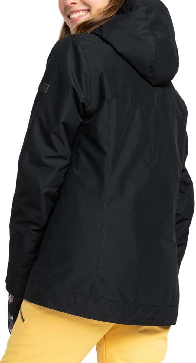Roxy Women's Billie Insulated Jacket - A black insulated jacket with a hood, featuring a small rectangular logo on the upper left arm and a zippered pocket on the lower right side.