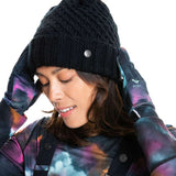 Roxy Women's Blizzard Beanie 2022 - A black knit beanie with a tan faux fur pom-pom on top.