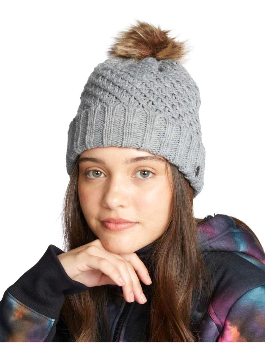 Roxy Women's Blizzard Beanie 2022 - A gray beanie with a brown faux fur pom-pom on top.