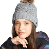 Roxy Women's Blizzard Beanie 2022 - A gray beanie with a brown faux fur pom-pom on top.