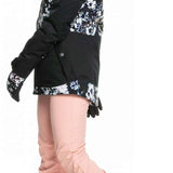 Roxy Women's Blizzard Beanie - A pink beanie with a pom-pom on top and a white logo embroidered on the front.