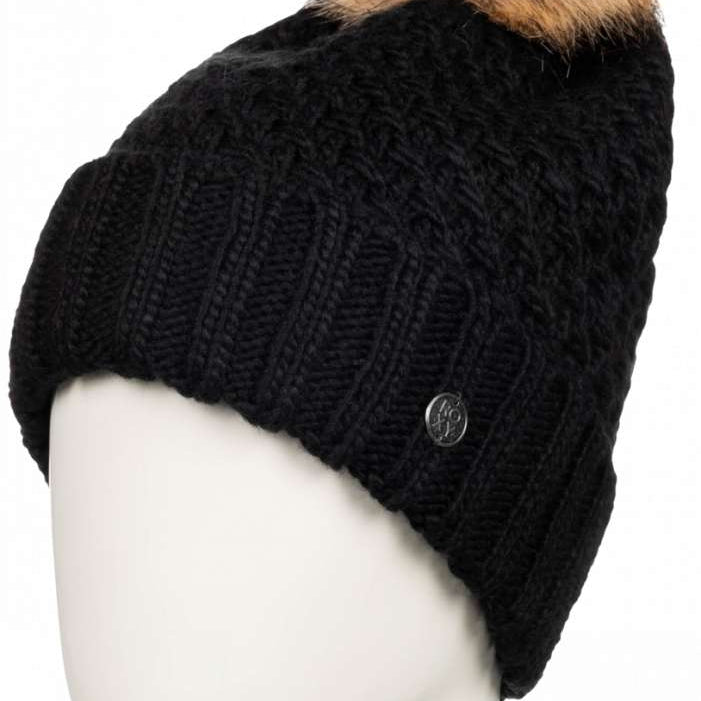 Roxy Women's Blizzard Beanie 2023 - A black beanie with a brown faux fur pom-pom on top.