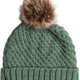 Roxy Women's Blizzard Beanie 2024 - A sage green beanie with a brown faux fur pom-pom on top.