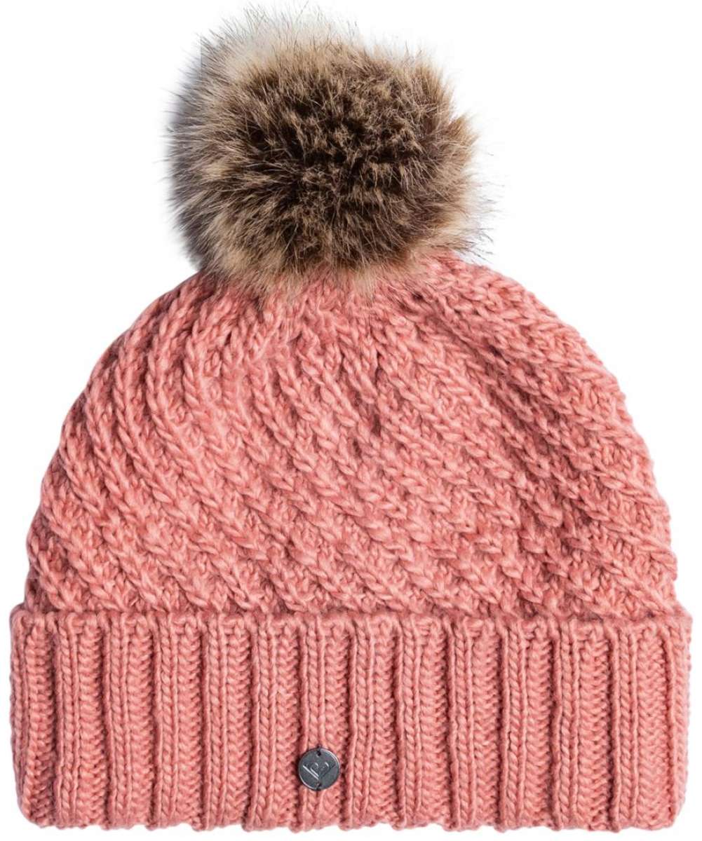 Roxy Women's Blizzard Beanie 2024 - A dusty rose-colored beanie with a cable-knit pattern and a large, fluffy brown faux fur pom-pom on top.