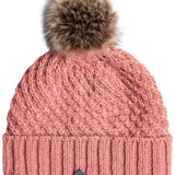Roxy Women's Blizzard Beanie 2024 - A dusty rose-colored beanie with a cable-knit pattern and a large, fluffy brown faux fur pom-pom on top.