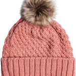 Roxy Women's Blizzard Beanie 2024 - A dusty rose-colored beanie with a cable-knit pattern and a large, fluffy brown faux fur pom-pom on top.
