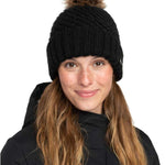 Roxy Women's Blizzard Beanie 2024 - Black beanie with a brown faux fur pom-pom on top.
