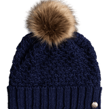Roxy Women's Blizzard Beanie 2022 - A navy blue beanie with a large, fluffy brown faux fur pom-pom on top.