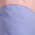 Roxy Women's Chloe Kim Bib Pant 2023 - White bib pants with a subtle floral pattern on the side of the leg.