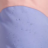 Roxy Women's Chloe Kim Bib Pant 2023 - White bib pants with a subtle floral pattern on the side of the leg.