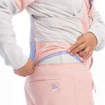 Roxy Women's Chloe Kim Bib Pant 2023 - Light blue bib with a white logo on the left thigh and black accents around the waistband.