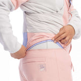 Roxy Women's Chloe Kim Bib Pant 2023 - Light blue bib with a white logo on the left thigh and black accents around the waistband.