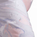 Roxy Women's Chloe Kim Insulated Pant 2023 - White snow pants with a subtle marbled pattern of blue and pink swirls.