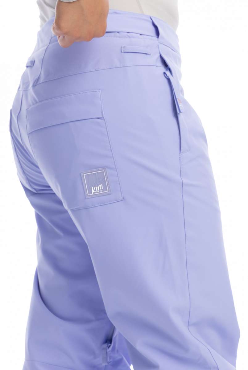 Roxy Women's Chloe Kim Insulated Pant 2023 - A pair of light purple snow pants with a white logo on the left thigh.