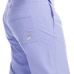 Roxy Women's Chloe Kim Insulated Pant 2023 - A pair of light purple snow pants with a white logo on the left thigh.