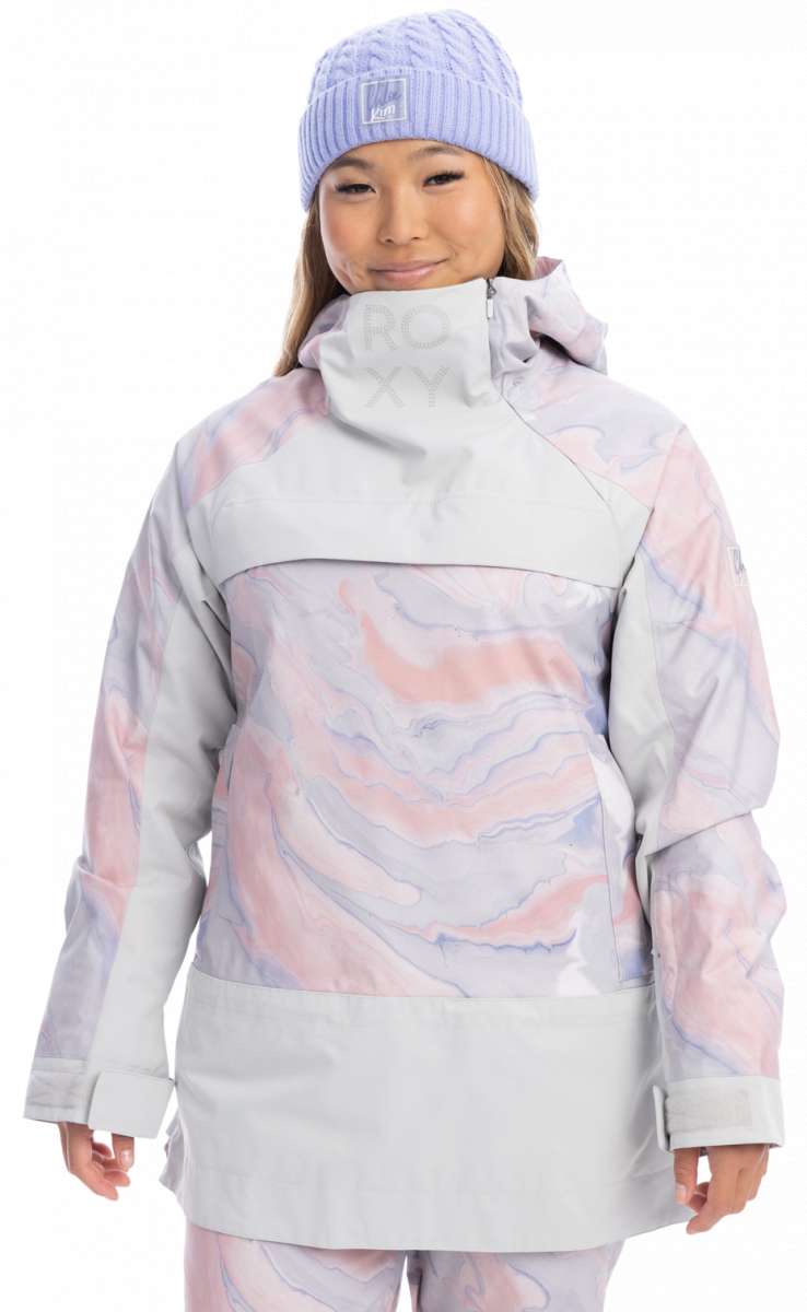 Roxy Women's Chloe Kim Overhead Jacket 2023 - A pastel pink and purple marbled jacket with a high collar, worn by a model against a white background.