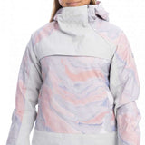Roxy Women's Chloe Kim Overhead Jacket 2023 - A pastel pink and purple marbled jacket with a high collar, worn by a model against a white background.