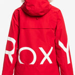 Roxy Women's Chloe Kim Overhead Jacket 2023 - A red jacket with a white fur-lined hood and large "ROXY" logo on the back in white letters.