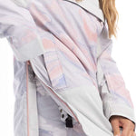 Roxy Women's Chloe Kim Overhead Jacket 2023 - A white jacket with a pink and blue marbled pattern, featuring a zippered pocket on the chest.