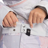 Roxy Women's Chloe Kim Overhead Jacket 2023 - A light gray jacket with a pink zipper and silver snap buttons.