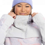 Roxy Women's Chloe Kim Overhead Jacket 2023 - A light blue jacket with a white logo on the chest and a hood.
