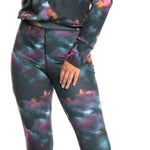 Roxy Women's Daybreak Base Layer Bottoms 2022 - A pair of black base layer bottoms with a subtle pink and blue pattern.