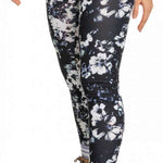 Roxy Women's Daybreak Bottom Base Layer 2023 - Black base layer with white floral pattern and a high waistband.