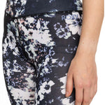 Roxy Women's Daybreak Bottom Base Layer 2023 - A pair of black base layer bottoms with a subtle white floral pattern.