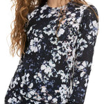 Roxy Women's Daybreak Top Base Layer 2023 - A black top with a white floral pattern and a crew neck.