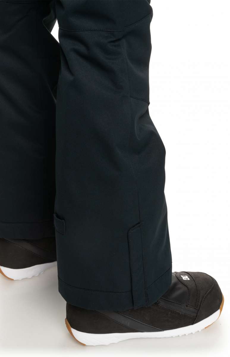 Roxy Women's Diversion Insulated Pant 2023 - Black snow pants with a subtle white logo on the left leg, featuring a zippered pocket and a sleek design.