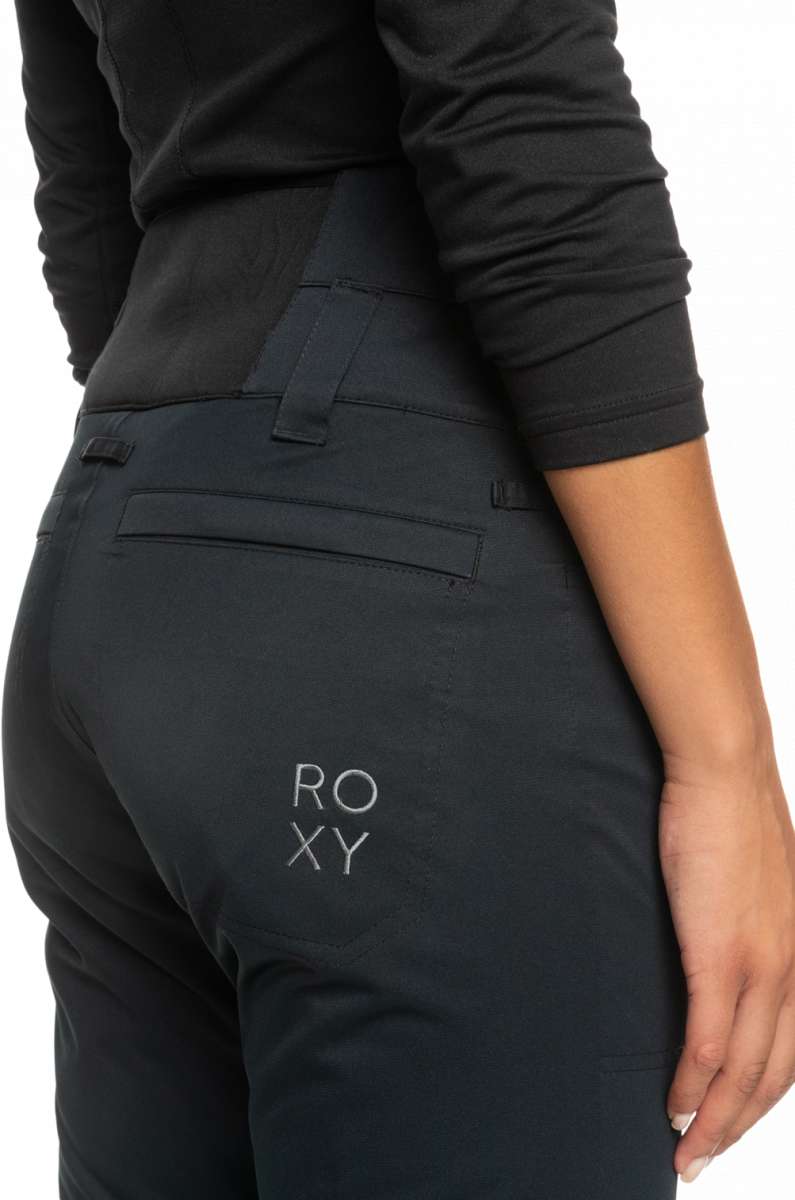 Roxy Women's Diversion Insulated Pant 2023 - A pair of black insulated ski pants with a white logo on the left thigh.