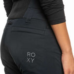 Roxy Women's Diversion Insulated Pant 2023 - A pair of black insulated ski pants with a white logo on the left thigh.