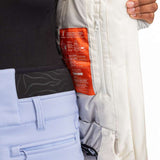 Roxy Women's Dusk Warmlink Insulated Jacket 2024 - A light gray jacket with a darker gray pattern on the back and sleeves, featuring a zippered pocket on the chest.