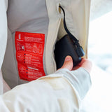 Roxy Women's Dusk Warmlink Insulated Jacket 2024 - A white jacket with a red label on the inside lining, featuring a zipper and a black cord attached to it.