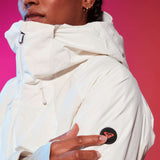 Roxy Women's Dusk Warmlink Insulated Jacket 2024 - A white jacket with a hood, featuring a black and red logo on the left sleeve.