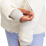 Roxy Women's Dusk Warmlink Insulated Jacket 2024 - A cream-colored jacket with a zippered pocket on the left side and silver zipper pull.