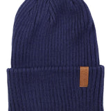 Roxy Women's Dynabeat Beanie 2022 - A navy blue beanie with a tan leather logo patch on the front.