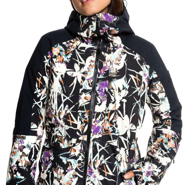 Roxy Women's Essence Gore-Tex Stretch Jacket 2022 - A black jacket with a white floral pattern and purple accents, featuring a zippered front and hood.