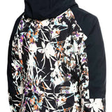Roxy Women's Essence Gore-Tex Stretch Jacket 2022 - A black jacket with a white floral pattern and purple accents, worn by a model from behind.