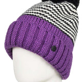 Roxy Women's Frozenfall Beanie 2022 - A purple beanie with a black and white houndstooth pattern on top, featuring a large black pom-pom at the top.