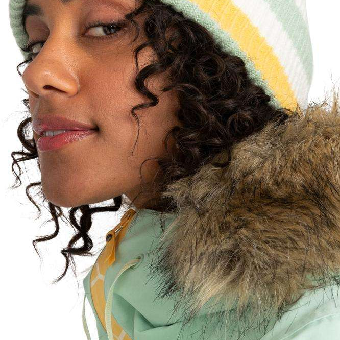 Roxy Women's Gold Hope Beanie 2024 - A mint green beanie with a yellow stripe and white stripes on either side of it.
