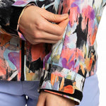 Roxy Women's Jet Ski Insulated Jacket 2023 - A pastel-colored jacket with a floral pattern and black accents, featuring a zipper down the front.