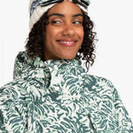 Roxy Women's Jetty Insulated Jacket - A white jacket with a green abstract floral pattern and a hood, featuring a zipper closure.
