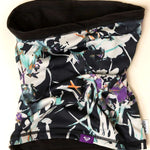 Roxy Women's Lana Collar - A black, white, purple, and orange abstract floral patterned neck warmer with a black trim.