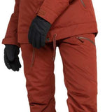 Roxy Women's Meade Insulated Jacket - A rust-colored jacket with a fur-lined hood and zippered pockets.