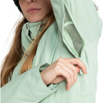 Roxy Women's Meade Insulated Jacket - A mint green jacket with a hood and silver snap buttons on the collar.
