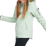 Roxy Women's Meade Insulated Jacket 2024 - A mint green jacket with a fur-lined hood and silver zipper.