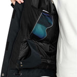 Roxy Women's Meade Insulated Jacket - A black insulated jacket with a blue logo on the left chest and a white tag on the right side of the waist.