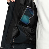 Roxy Women's Meade Insulated Jacket - A black insulated jacket with a blue logo on the left chest and a white tag on the right side of the waist.